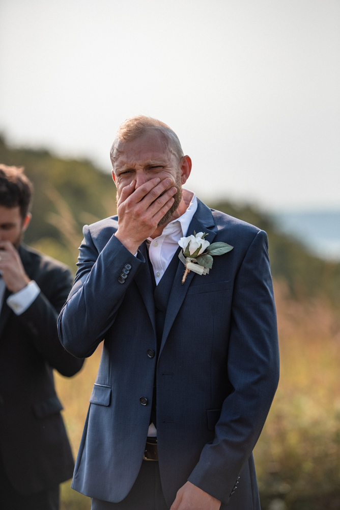 Groom sees his beautiful bride for the first time. 
