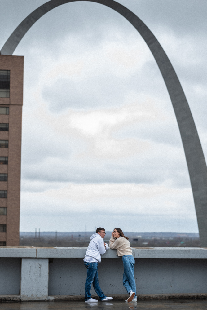 Stand with me, that's all I need. The couple says a few last sweet nothings under the st louis arch before ending their st louis date night