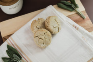 Vegan Sage Biscuits laid out on Hearth and Hand with Magnolia Kitchen Dish towel from target